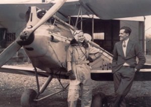 Joy Lloyd is seen  with Club Flying Instructor J.G. Harcombe in 1932
